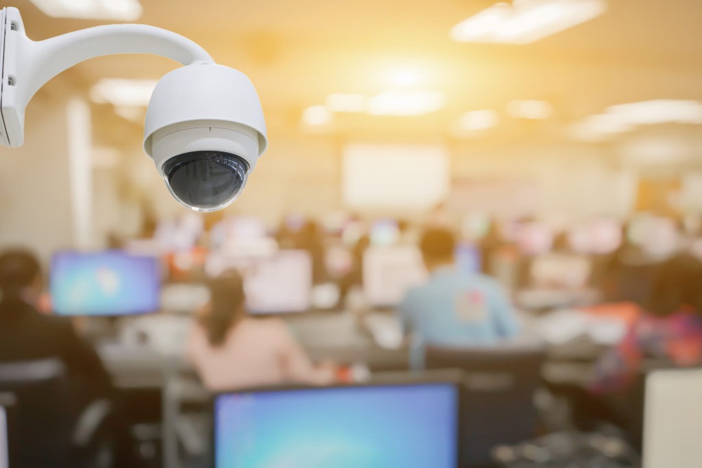 Summer To-Do List: Closed-circuit television,CCTV Camera Operating inside Class room,computer room,use video cameras transmit a signal to a specific place,on white background with clipping path.
